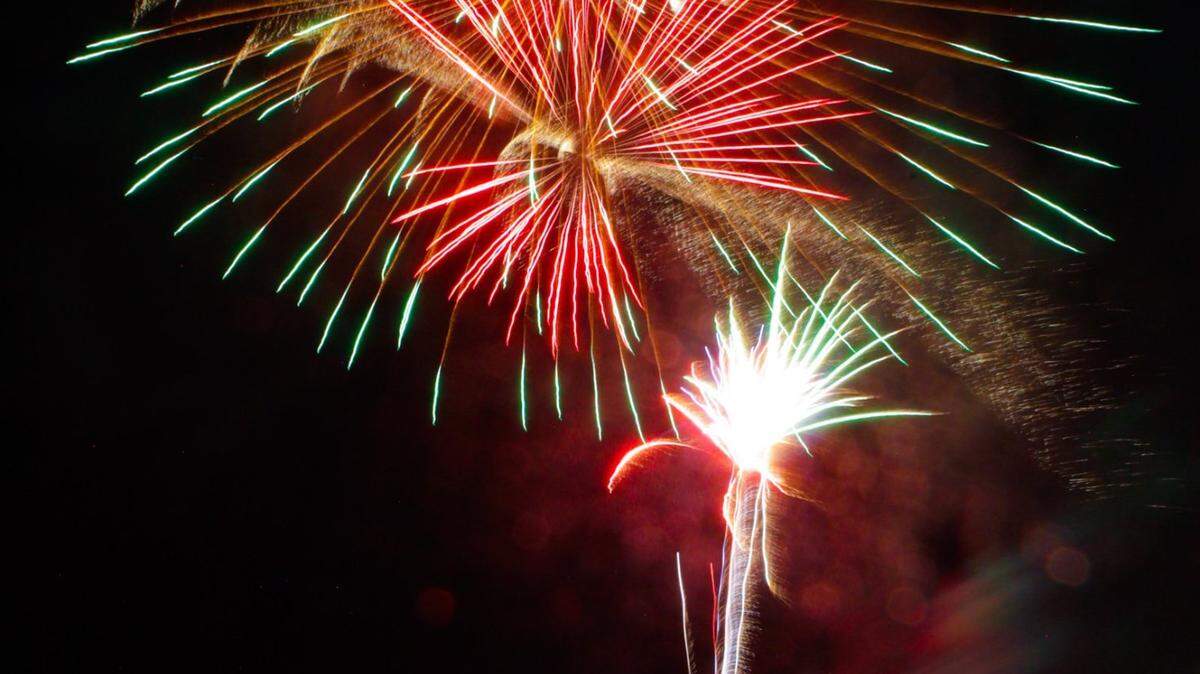 Spectators gather to watch the annual July 4th fireworks display at the Surfside Pier Thursday.