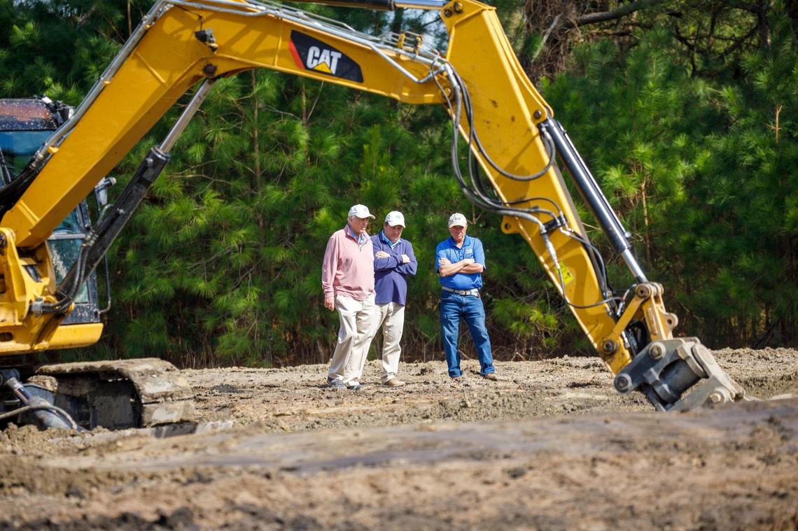 The Wellman Club has been closed since 2010 but renowned course architect Rees Jones has been hired to redesign the course for a rebirth later this year as a municipal course for the City of Johnsonville, S.C. Jones (left) and Bryce Swanson (center), golf course co-designers, met with Clyde Hall (right) of Southeastern Golf Inc. at the site on Friday. February 18, 2022.