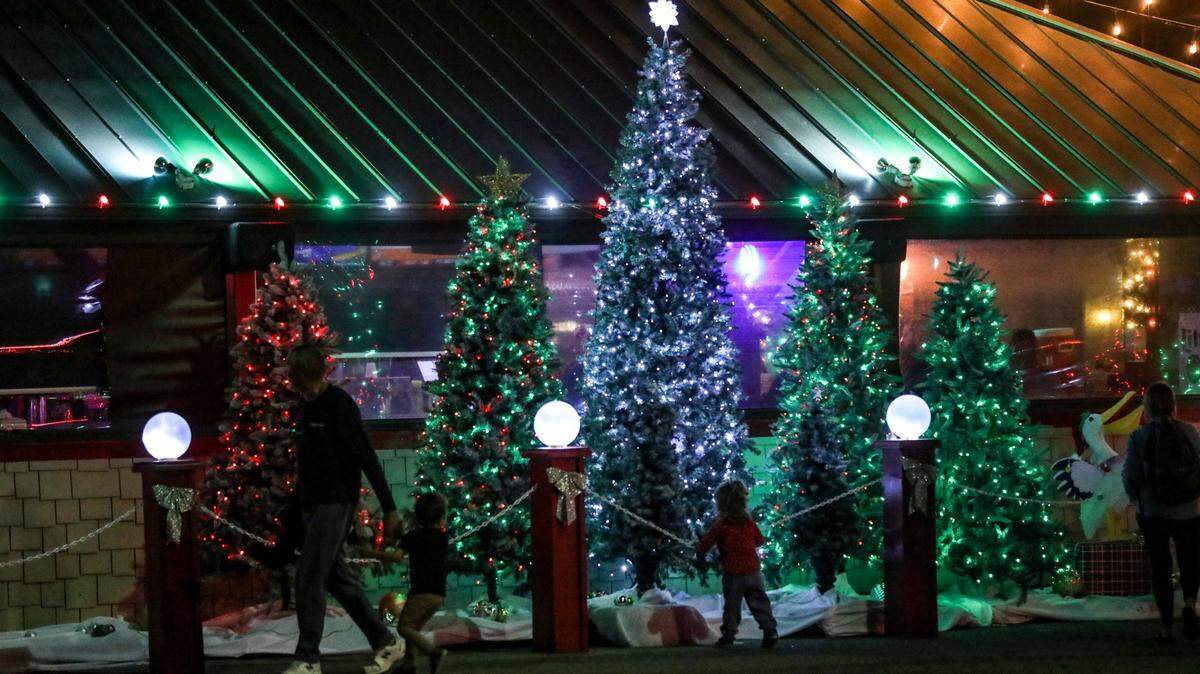 The Murrells Inlet Marshwalk, lit with holiday displays, has become a destination for visitors to walk it's half mile length, taking in the lights, food and music from it's eight waterfront restaurants. 