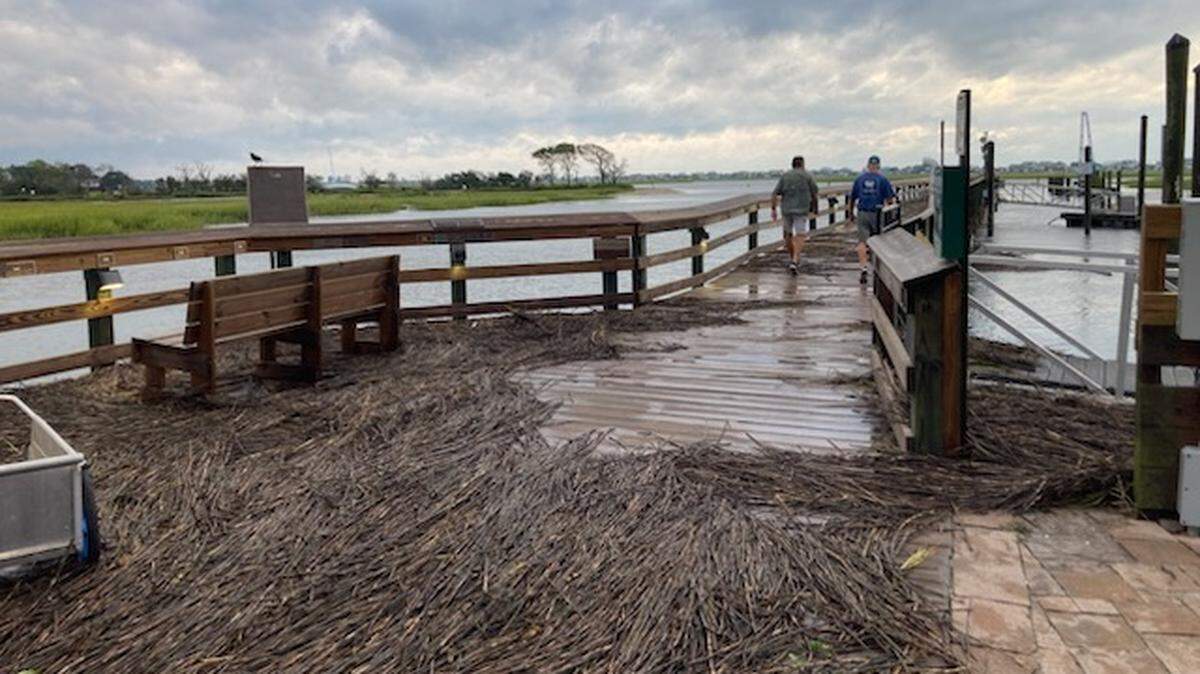 Marsh reeds and storm debris covered much of the Marshwalk at Murrells Inlet early Thursday August 31 following Tropical Storm Idalia.