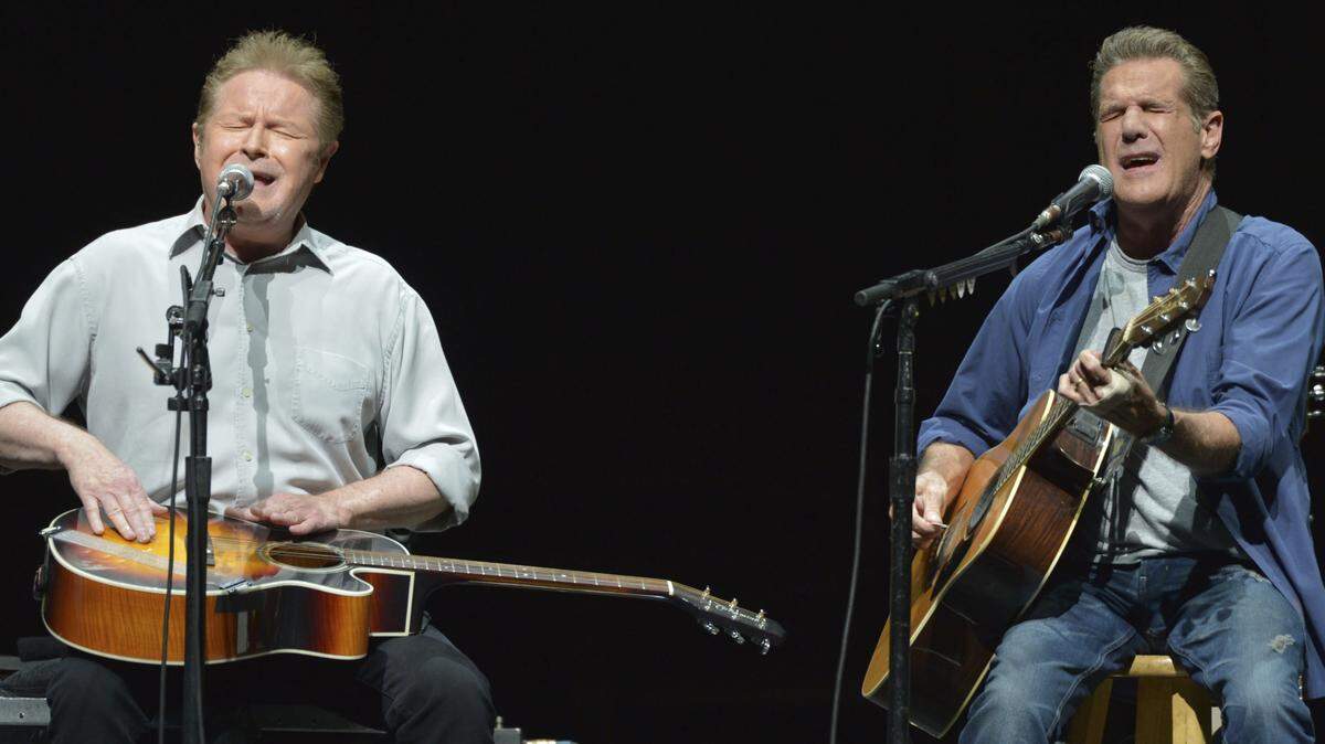 FILE - In this Jan. 15, 2014, file photo, Don Henley, left, and Glenn Frey of The Eagles perform on the “History of the Eagles” tour at the Forum in Los Angeles. The Eagles’ greatest hits album has surpassed Michael Jackson’s “Thriller” as the best-selling album of all-time. (Photo by John Shearer/Invision/AP, File)