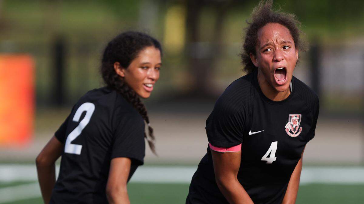 Corine Gregory (4) of Waccamaw reacts after scoring a goal as teammate and sister Halina Gregory (2) looks on during the SCHSL Class 3A Girls State Soccer Championship between Waccamaw and Travelers Rest at Irmo High School on Saturday, May 13, 2023.