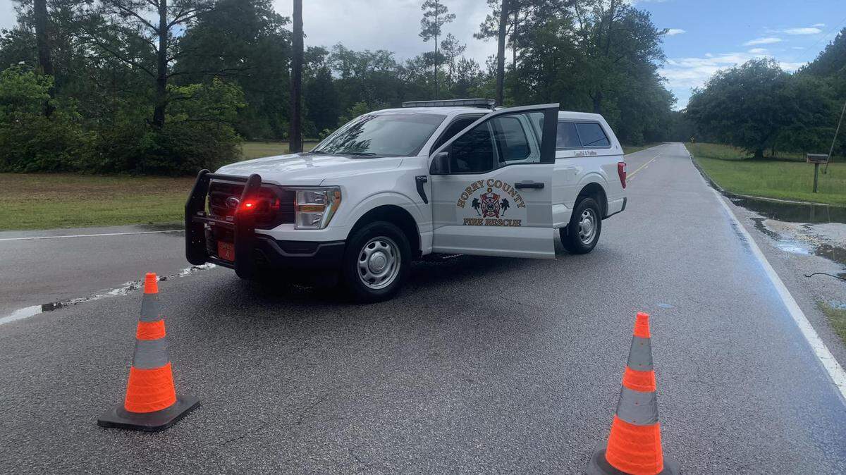 Horry County Fire Rescue responded to a large downed tree in Nichols Sunday that blocked lanes of traffic until it could be removed. High winds, which will continue Tuesday, have caused damage in the area.