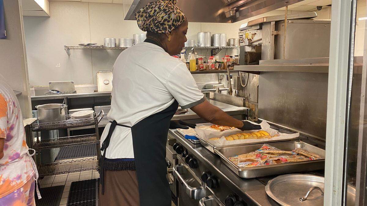 Lisa Greene, kitchen manager at the Community Kitchen on Mr. Joe White Avenue, prepares breakfast Friday morning as Hurricane Ian impacts the downtown Myrtle Beach area. September 30, 2022.