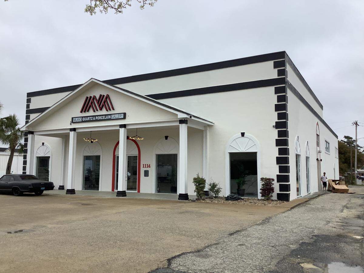 The owners of Milano Quartz and Porcelain Gallery have purchased the adjacent building that houses Pat-Mor Salvage.