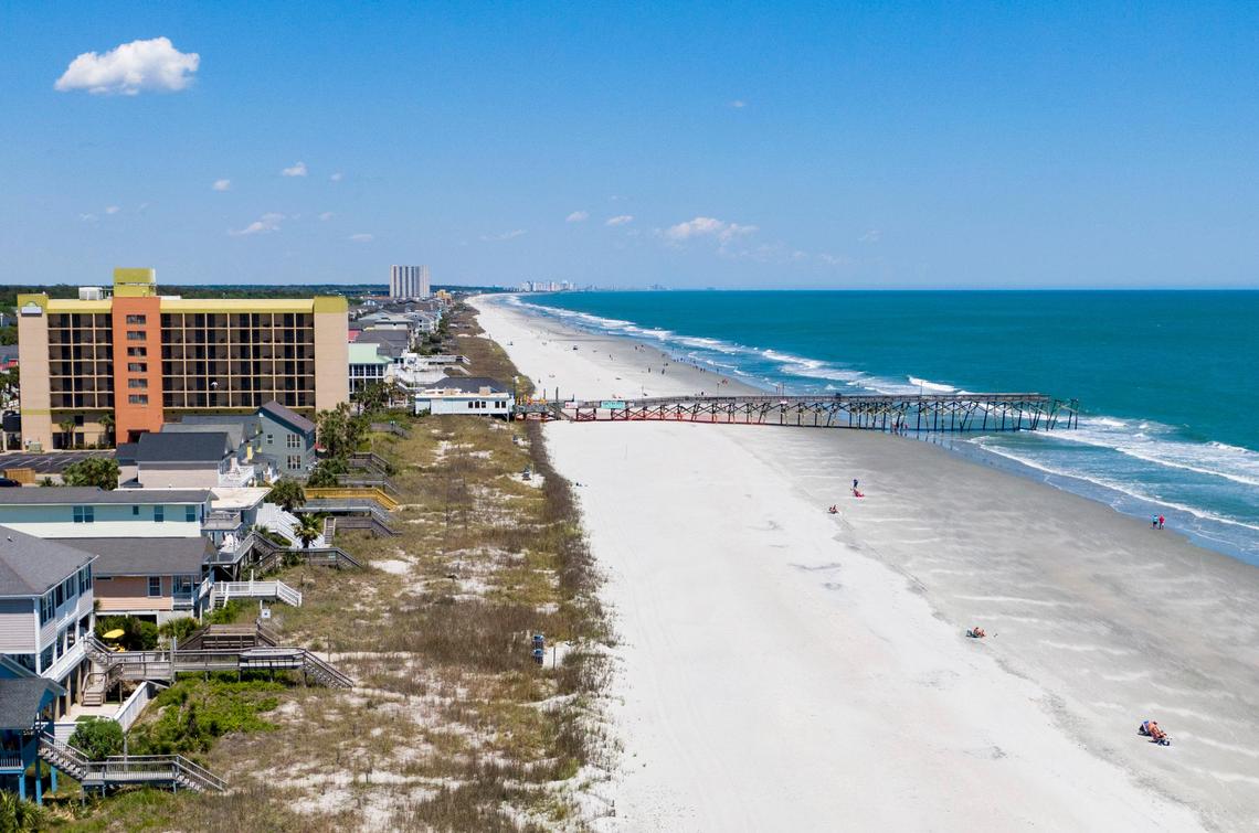 A northbound look along the South Carolina coast near the Surfside Pier Tuesday afternoon in Surfside Beach.