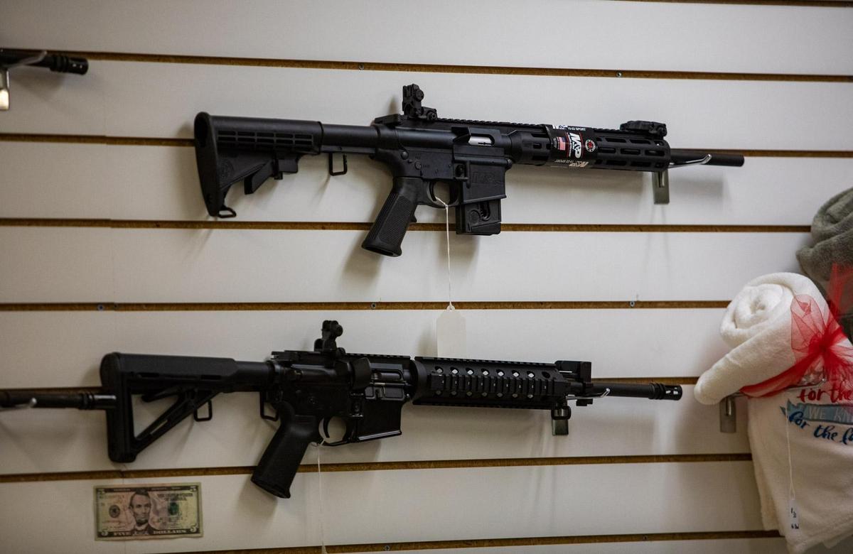 Assault rifles line the walls of Cormac Arms & Outfitters on 38th Avenue in Myrtle Beach.