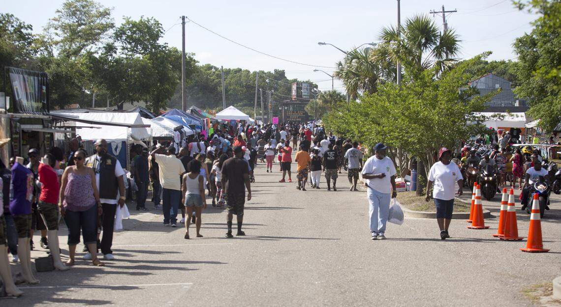 BikeFest attendees walk up and down 30th Avenue South in Atlantic Beach on Saturday, May 26, Day 2 of BikeFest.
