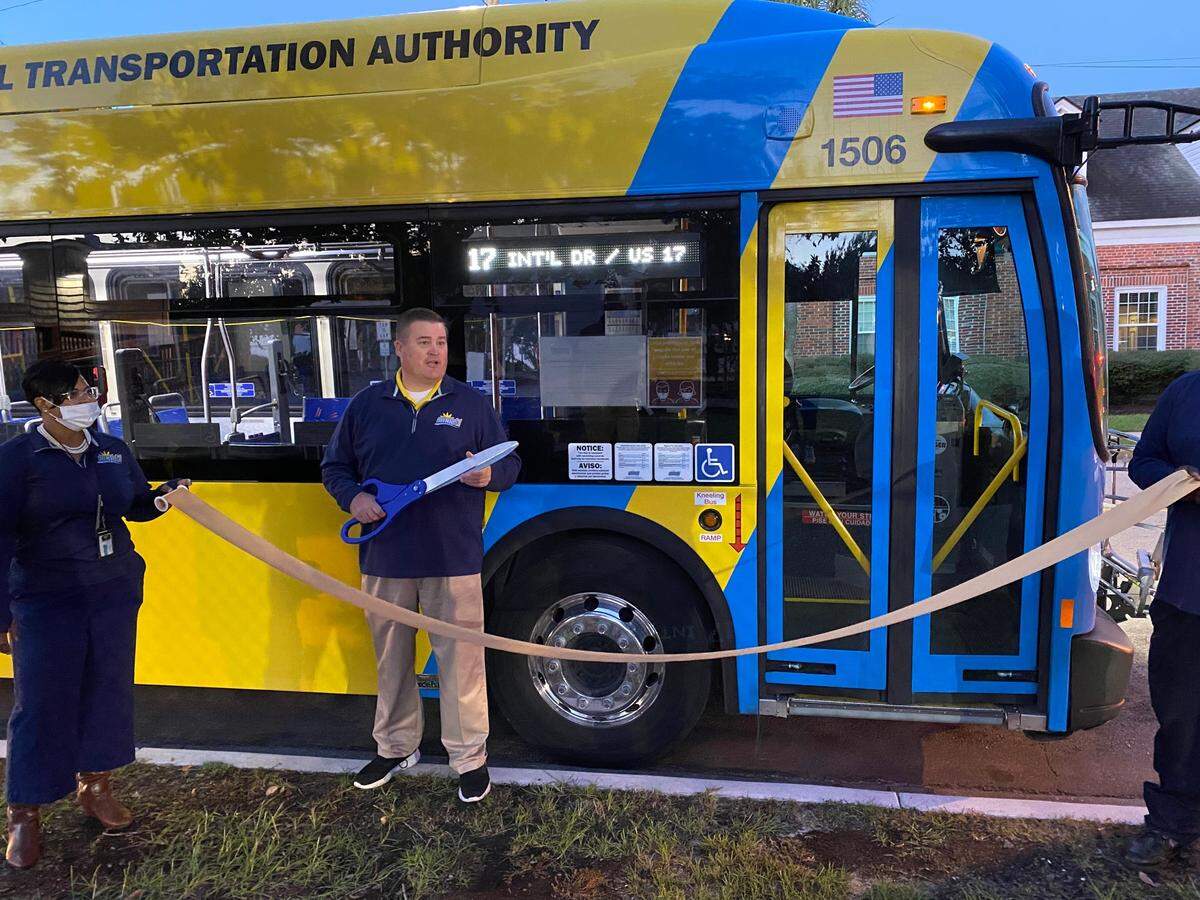 Coast RTA General Manager Brian Piascik prepares to cut a ribbon marking the start of a new bus route servicing North Myrtle Beach. 
