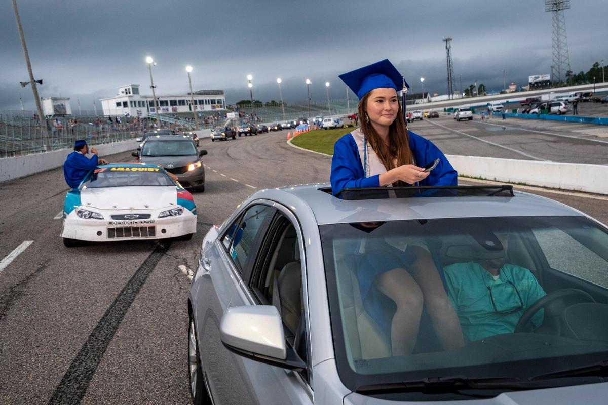 Sarah B. Joseph rides around the track with her classmates at the Myrtle Beach Speedway during graduation ceremonies for The Palmetto Academy for Learning Motorsports (PALM) charter high school on Friday. May 29, 2020
