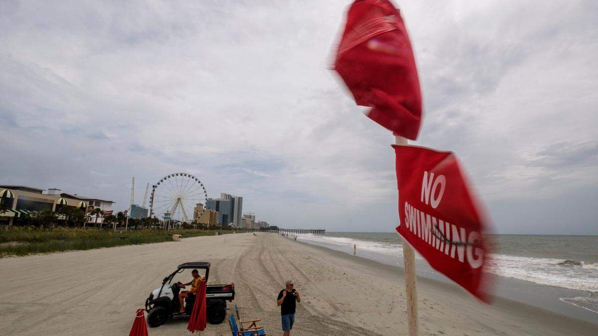No swimming flags fly over a lifeguard stand in downtown Myrtle Beach in this November Sun News file photo.