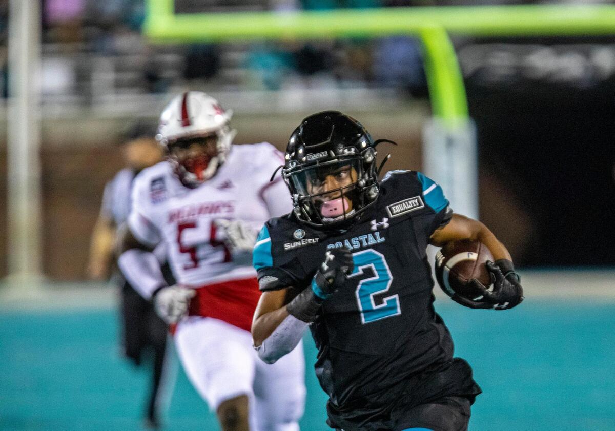 Coastal’s Reese White runs the ball against South Alabama on Saturday. Coastal Carolina, ranked No. 15 in this week’s AP Top 25 Poll, played South Alabama on Saturday night in a Sun Belt Conference football game at Brooks Stadium in Conway. November 7, 2020.