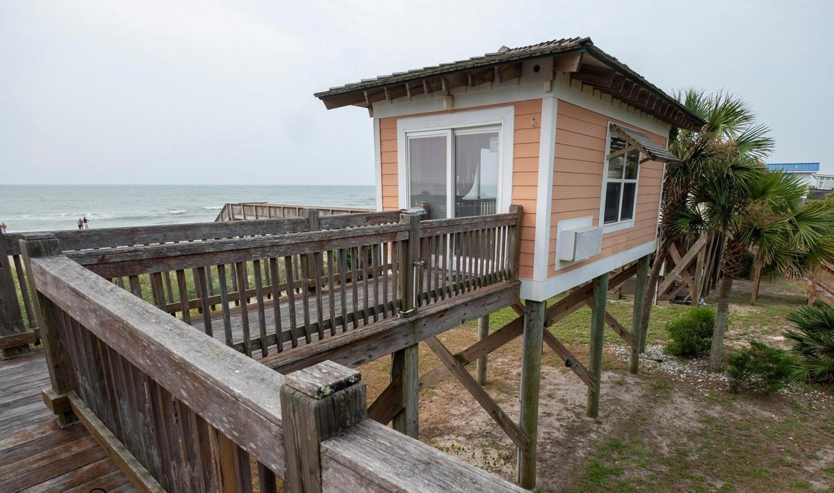 A pair of beach cabanas, two of only about 15 on this unique stretch of Myrtle Beach’s oceanfront know as the cabana section, are currently up for sale. The units are connected by an elevated boardwalk that leads to the Atlantic Ocean. While not for occupancy, owners enjoy a place of refuge on beach days. July 19, 2023.