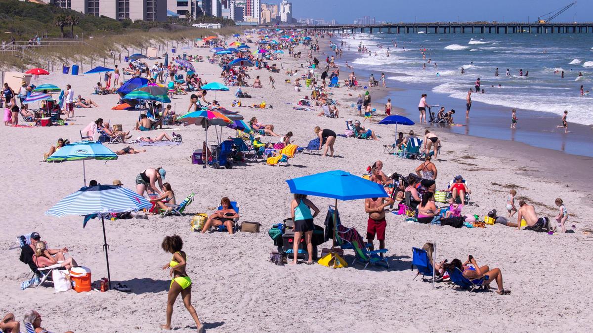 The view to the north from Myrtle Beach State Park Pier on Saturday. With hotels, beaches, shopping and restaurants reopening along the Grand Strand, tourist season kicked off this weekend despite coronavirus concerns. May 16, 2020