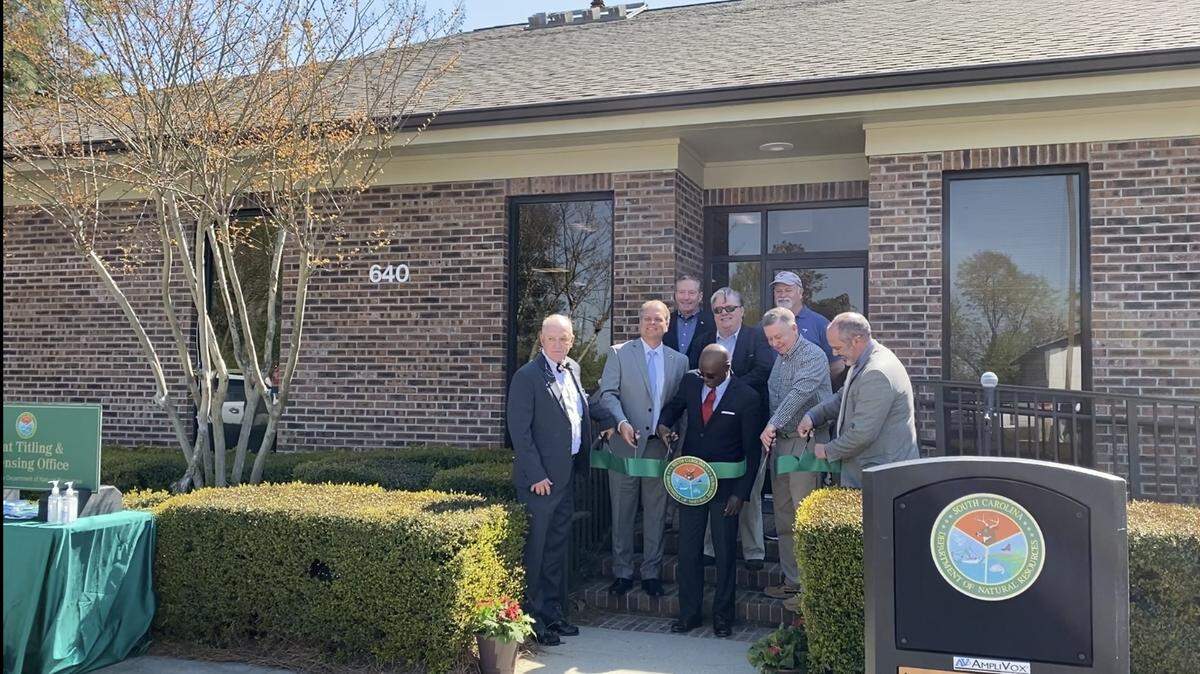 South Carolina state lawmakers, Horry County leaders and officials from the Dept. of Natural Resources cut a ceremonial ribbon in front of a new DNR customer service center in Aynor, the first Horry County office for the department.
