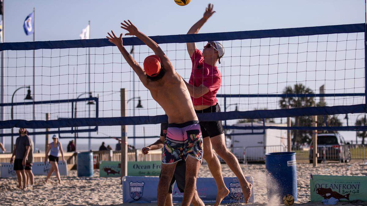 Beach volleyball players fill the courts along the Myrtle Beach Boardwalk to practice for a tournament this weekend. Grand strand residents and visitors head for the beach on the first sunny weekend of Spring. March 24, 2023.