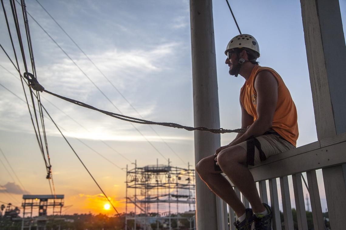 Stephen Murphy of Ireland finishes his last day of work at Myrtle Beach Zipline Adventures. Like many J-1 workers, Murphy plans to travel the United States before returning home. Friday, Aug. 25, 2017.