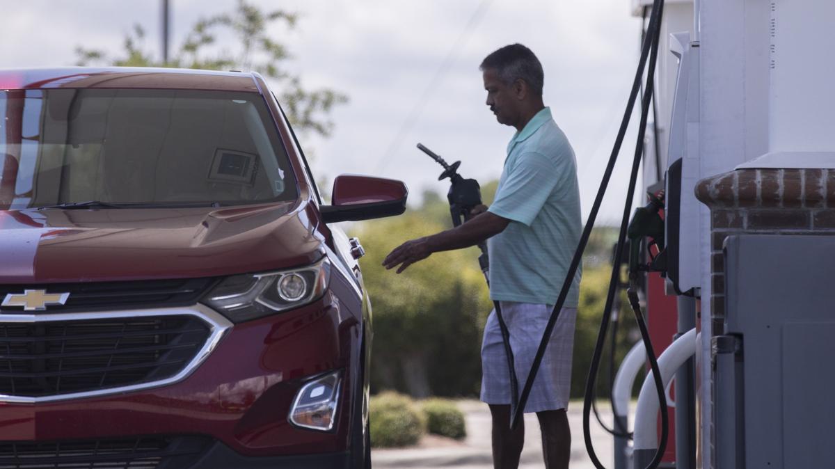 A customer pumps fuel at the Shell station on Mr. Joe White Avenue in Myrtle Beach, SC. 
Fuel prices are expected to hit a four year high during the July 4th holiday. Monday, July 2, 2018.