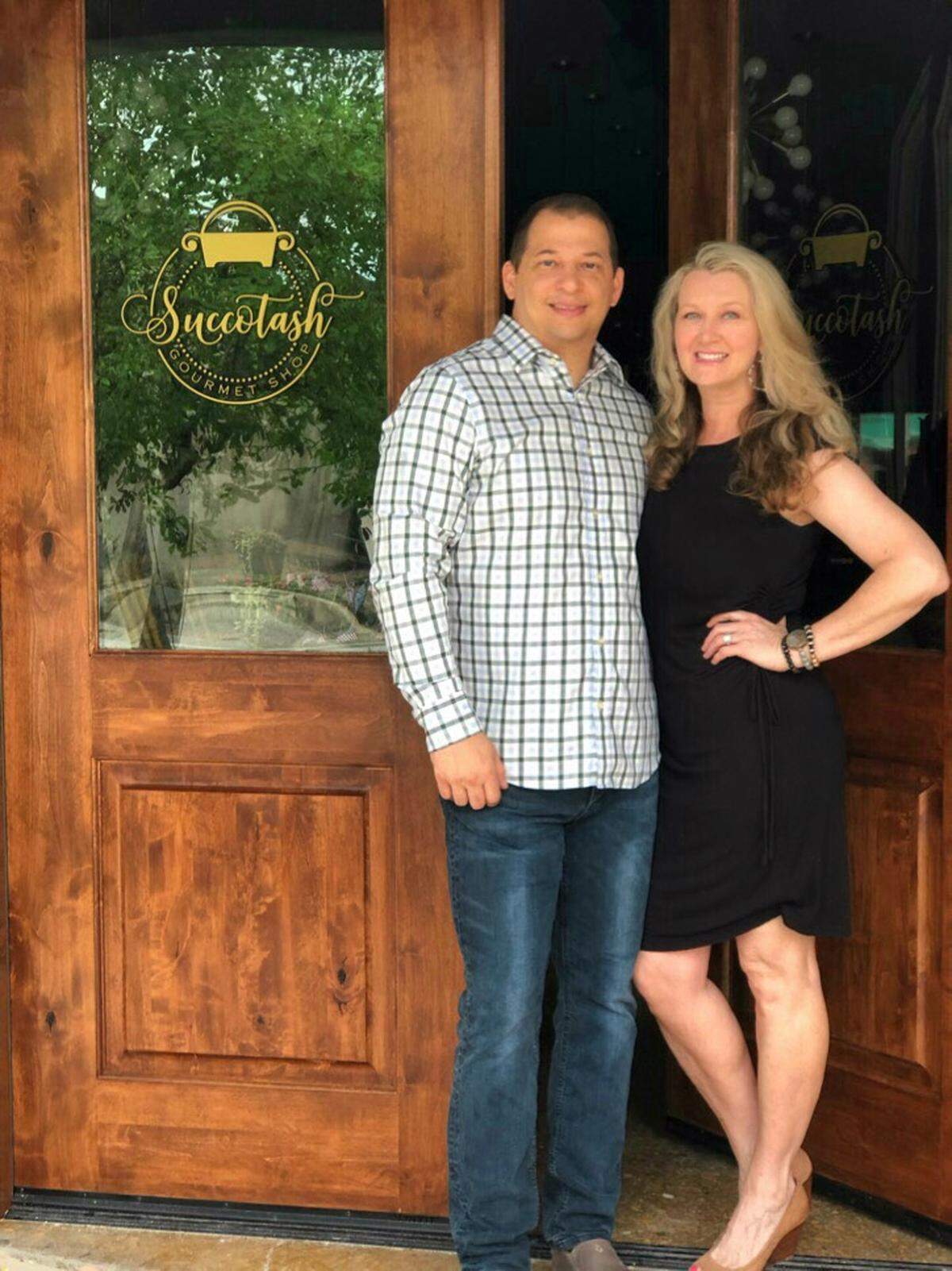 Melissa and Fred Woriax stand in front of their new store.