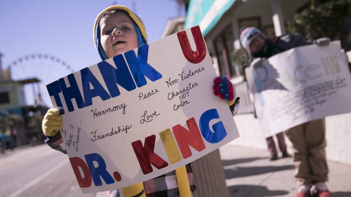 Despite frigid temperatures, a diverse group of participants marched along Ocean Boulevard to celebrate Martin Luther King Jr. Day in Myrtle Beach on Monday. Jan 21, 2019.