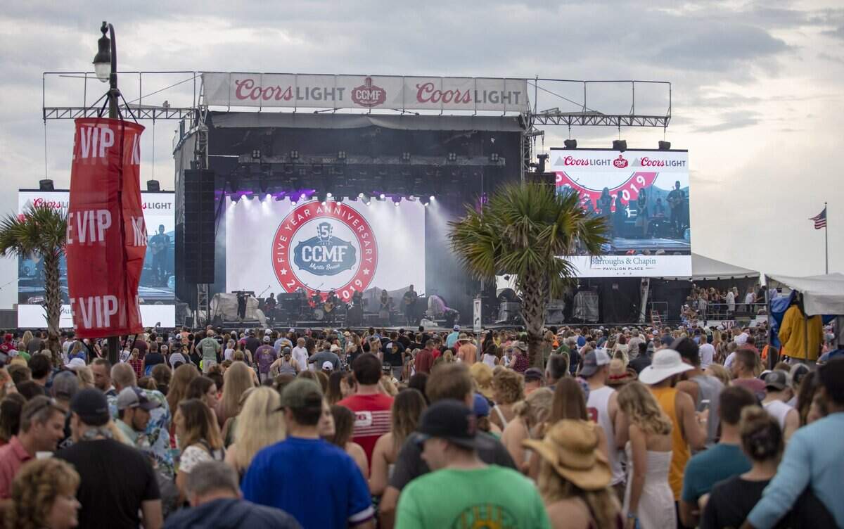 CCMF attendees brave the rain at Carolina Country Music Fest in Myrtle Beach. June 8, 2019.