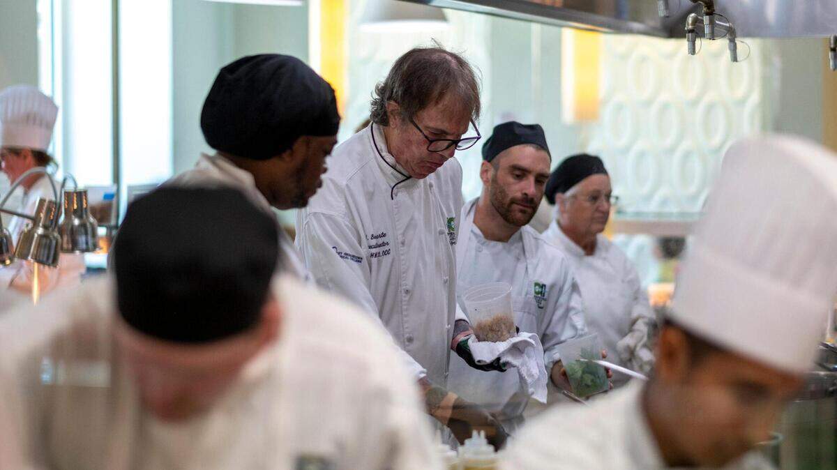 Chef Joe Bonaparte, Executive Director of the HGTC International Culinary Institute instructs his students during lunch service in the Fowler Dining Room. The restaurant, part of Horry-Georgetown Technical College is operated by culinary institute students in their second-and-final year of the program from Monday through Thursday for lunch. September 19, 2022.