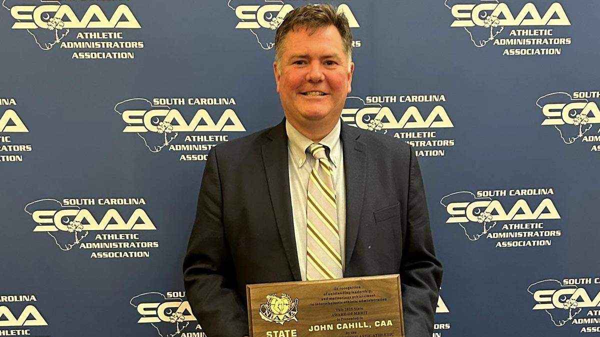 Myrtle Beach High School Athletic Director John Cahill was placed on paid administrative leave May 7, 2025 for “failure to complete job responsibilities’ just months after receiving a national merit award.