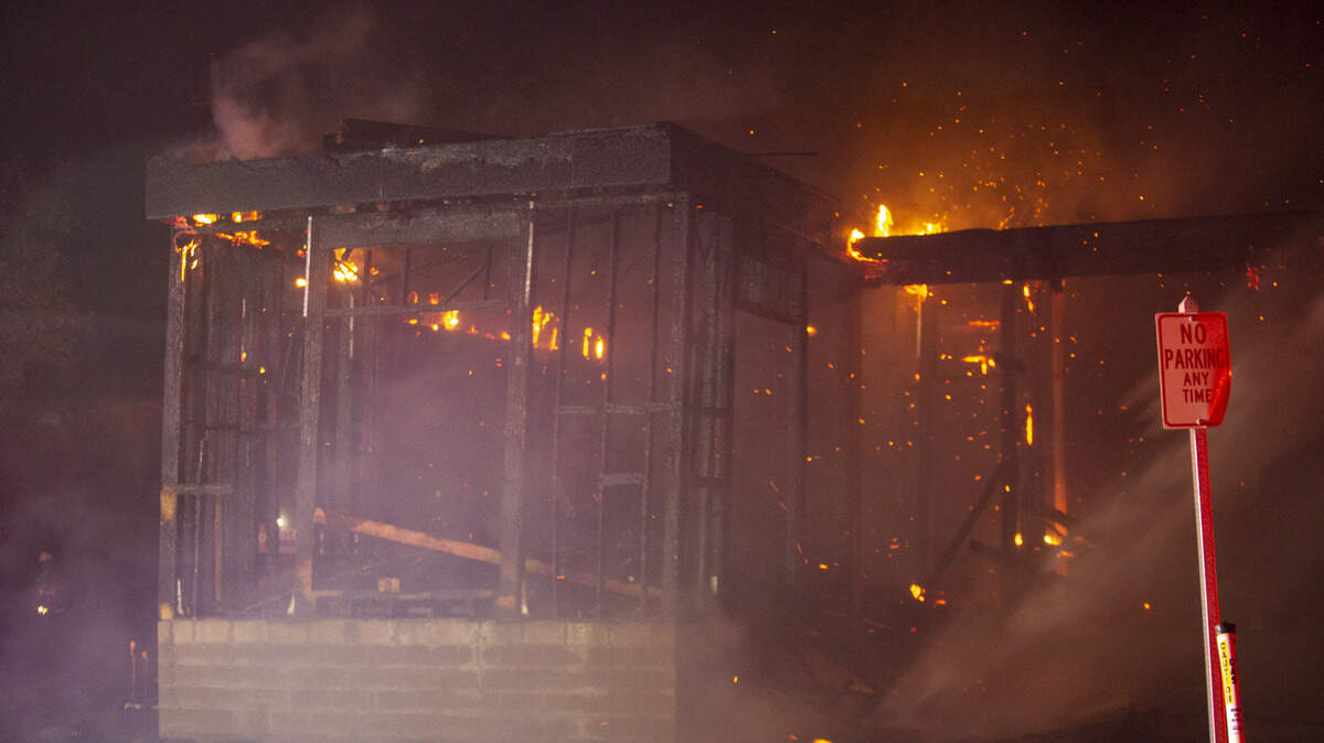 Myrtle Beach firefighters work to extinguish a fire ioff of 78th Ave. N. in Myrtle Beach Friday night.