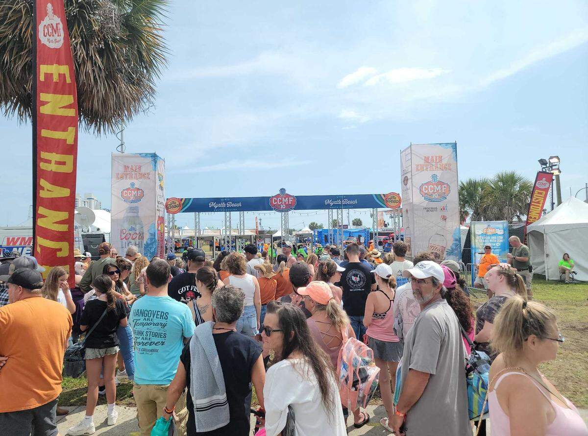 Hundreds lined up outside the Carolina Country Music Festival Thursday afternoon.