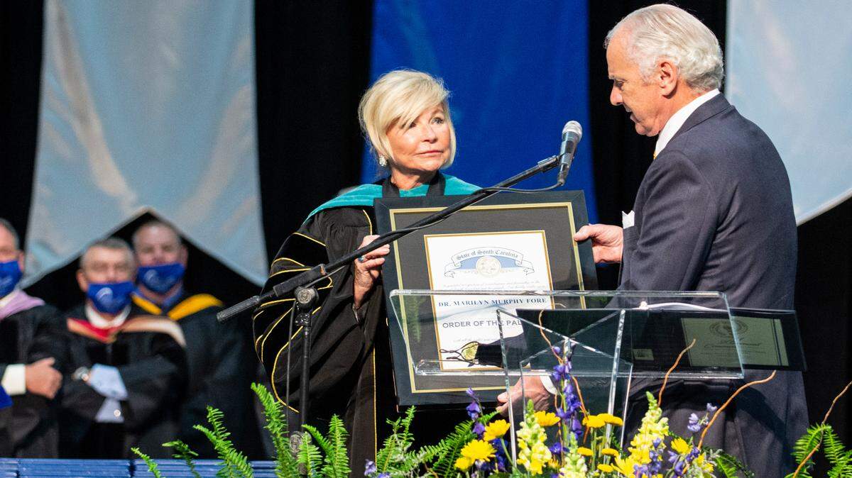 Many programs at Horry Georgetown Technical College are now free thanks to COVID relief aid from the federal government. Above, S.C. Gov. Henry McMaster awarded Horry-Georgetown Technical College’s president Marilyn Fore with the Order of Palmetto at the school’s spring commencement. May 12, 2021.