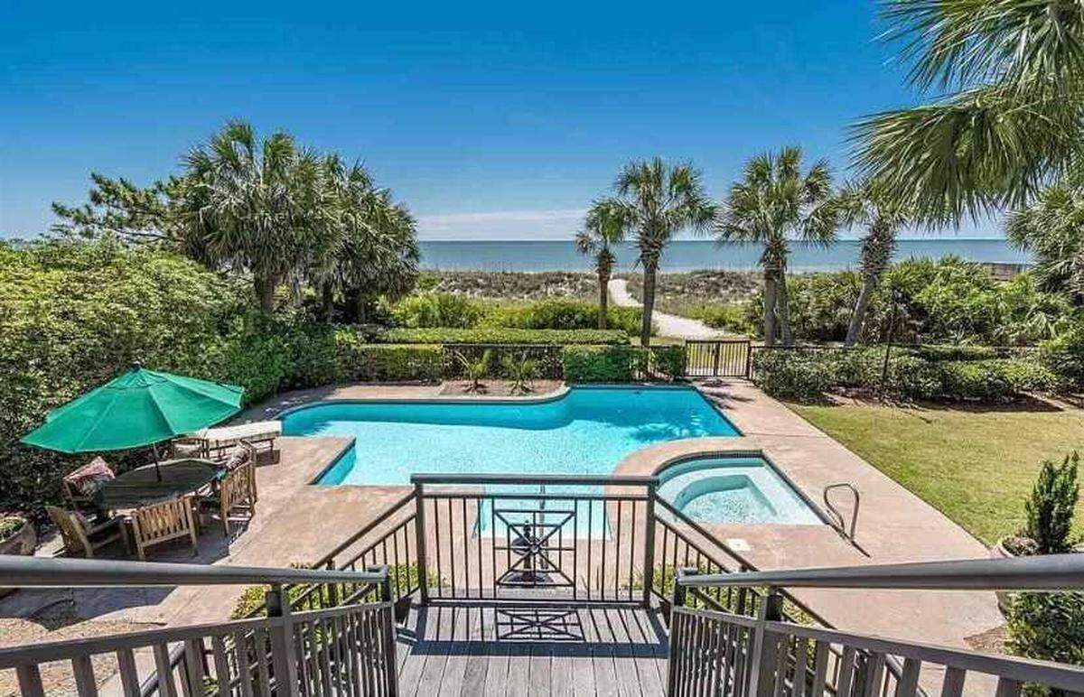 A gated beach house is for sale in Myrtle Beach on Ocean Boulevard for nearly $3 million. It has an oceanfront terrace, fitness room and two car garage.
