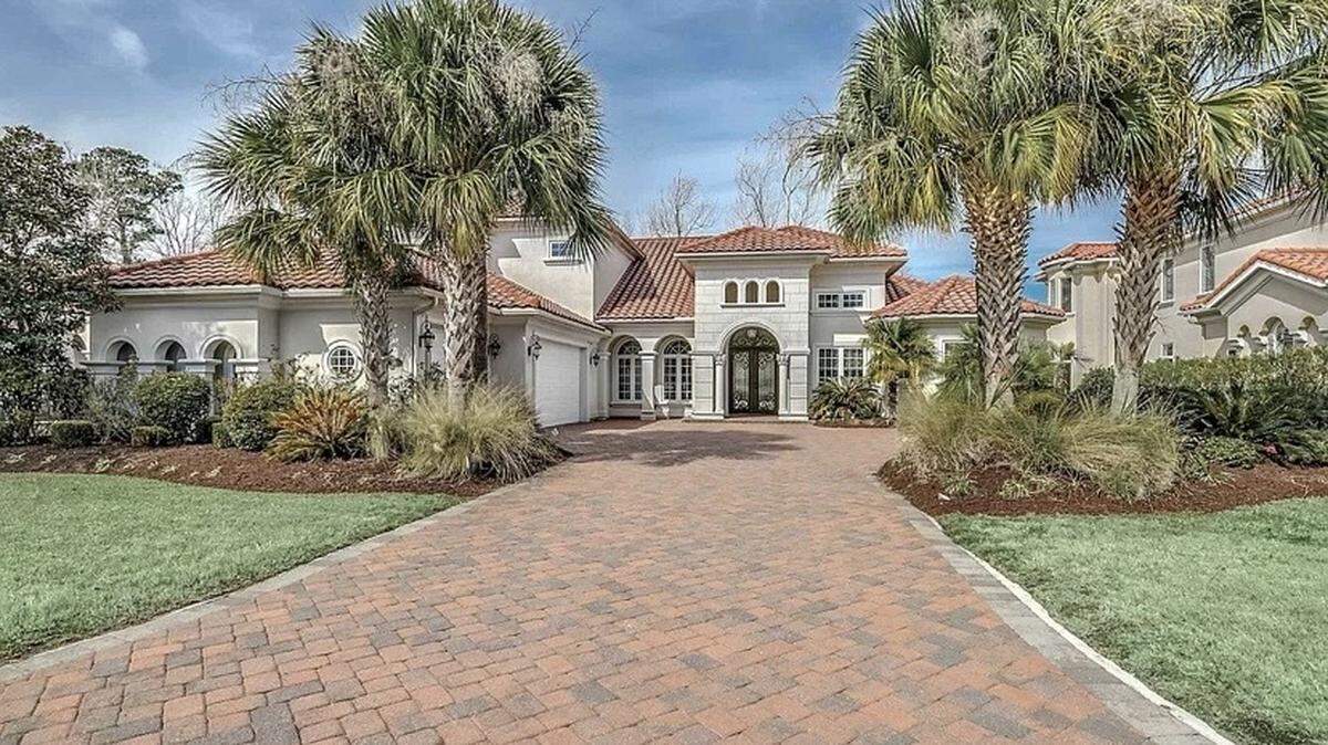 A property in Myrtle Beach is listed for sale on Zillow at $1 million-plus. The four bedroom, Mediterranean-style house is located in the Grand Dunes community.