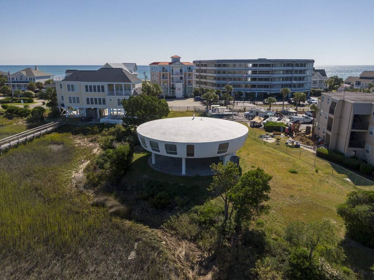 A mysterious cylindrical shaped house, known by locals as the “UFO house” on Garden City beach, overlooking Murrells Inlet, has withstood many hurricanes over the years since it was built in 1976 by Miami architect Peter Van Klout. Sept. 16, 2025.