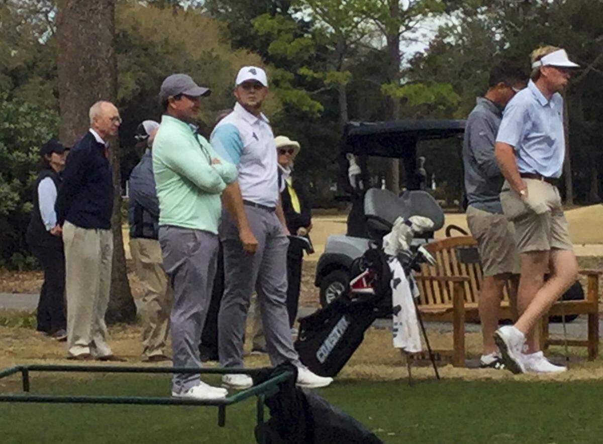 Coastal Carolina coach Jim Garren and golfer Zack Taylor stand on the ninth tee at The Dunes Golf and Beach Club during the 19th General Hackler Championship on March 10, 2020.