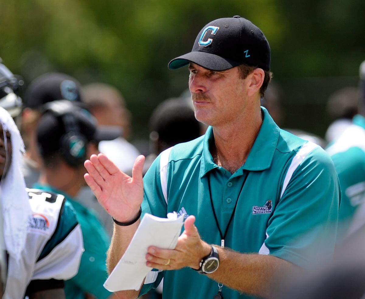 Head football coach David Bennett oversees a scrimmage ahead of a 2010 Coastal Carolina football game in this Sun News file photo.