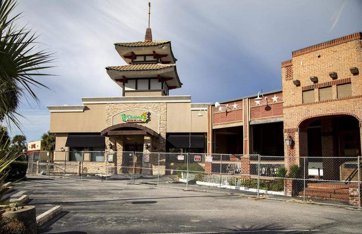 Chain-link fencing and signs surround La Casona Mexican Bar & Grill along North Kings Highway in Myrtle Beach on Tuesday morning. A fire broke out at the restaurant on February 24, 2019. | February 2, 2020.
