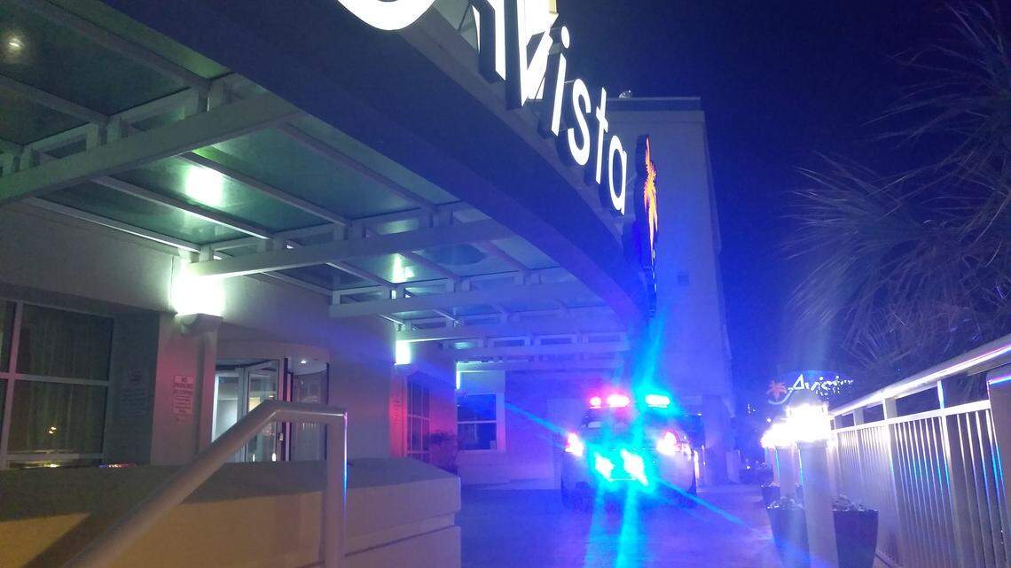Police are pictured at the scene of the Avista Resort.