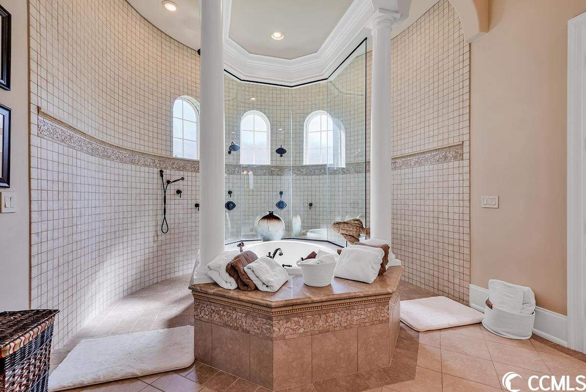 A home overlooking the Myrtle Beach’s Grande Dunes Members Club golf course is listed for $1.5 million. It has four bedrooms and a pool. Provided photo. Sept. 17, 2023.