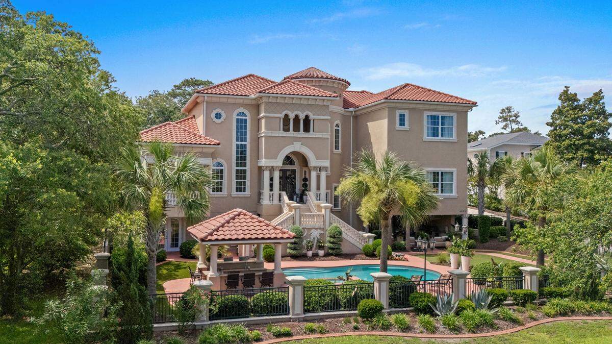 The five-bedroom, five-and-a-half-bathroom mansion is on the market for $4.8 million in Myrtle Beach’s Golden Mile.