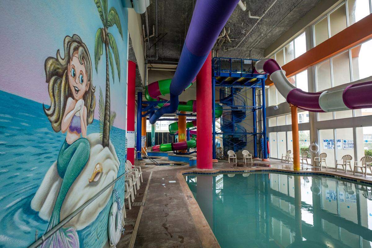Dunes Village Resort on North Ocean Boulevard has two indoor water entertainment areas including speed slides, lazy river, hot tubs, and children’s play area. Myrtle Beach area resorts with indoor water features are a draw for off-season tourism. December 14, 2022.