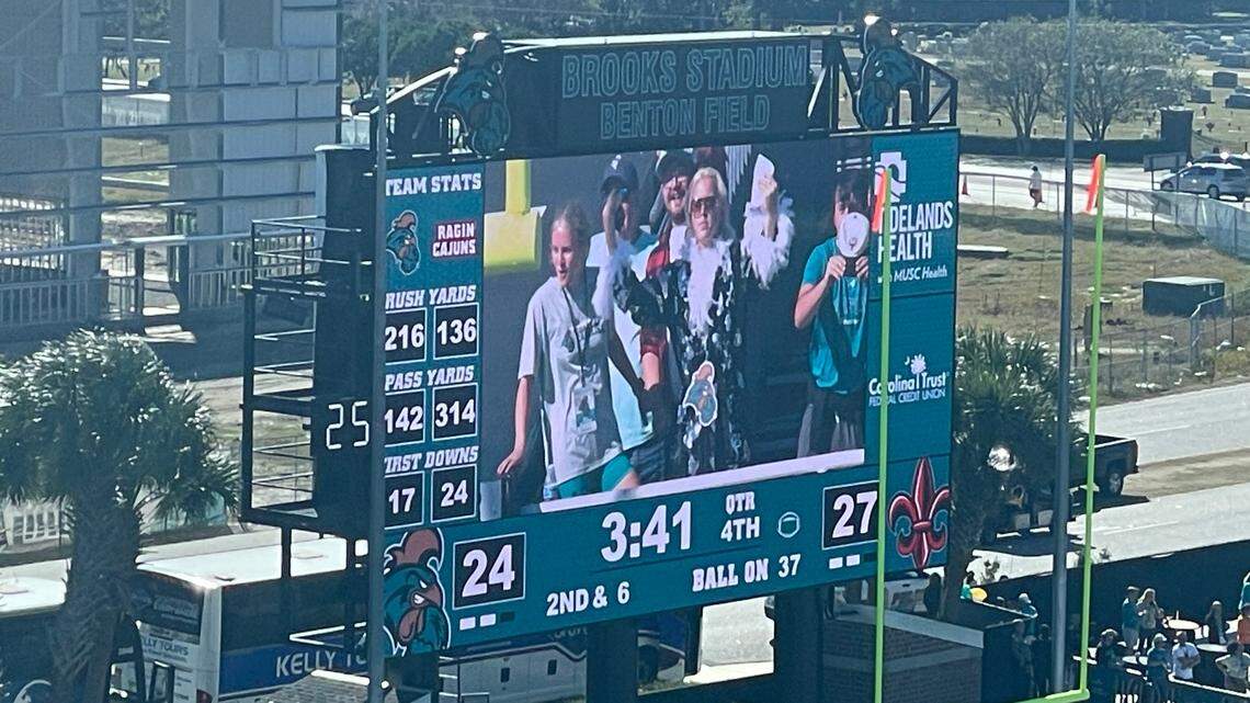 Woo! Ric Flair Halloween impersonator features during Coastal Carolina homecoming game