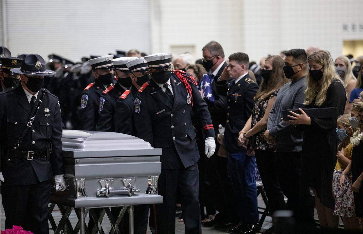 A public funeral service is being held today at the Myrtle Beach Convention Center for Pfc. Jacob Hancher, a Myrtle Beach police officer who was shot and killed earlier this week while responding to a domestic call. Police and first responders from around the region came to pay their respects. October 9, 2020.
