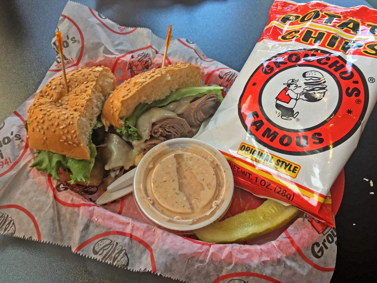 Groucho’s is known for their dipping style of sandwiches and many of their specialties come with a side of the famous Formula 45 sauce.