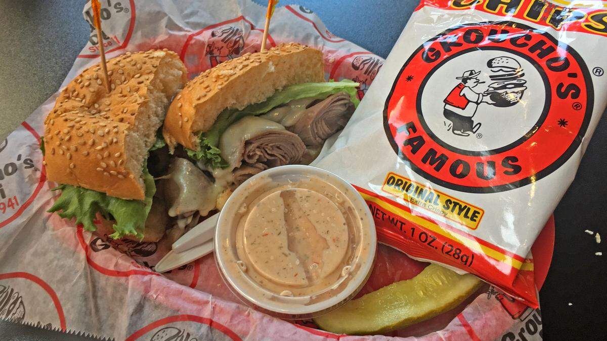 Groucho’s is known for their dipping style of sandwiches and many of their specialties come with a side of the famous Formula 45 sauce.