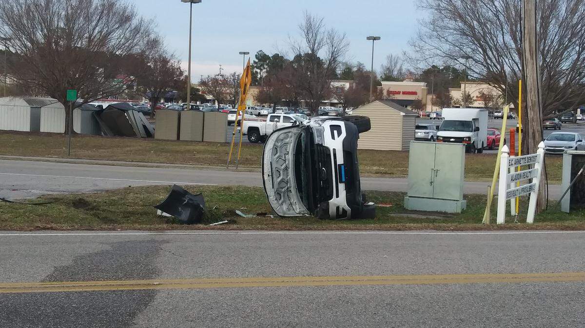 An overturned North Myrtle Beach police cruiser flipped over Thursday afternoon.