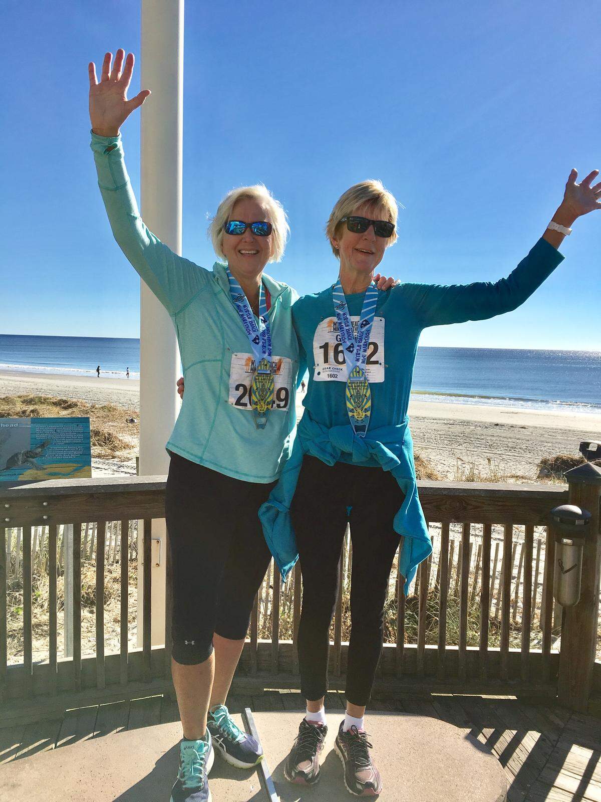 Gloria Reynolds stands with her friend Van Weston after completing a Myrtle Beach Mini Marathon.