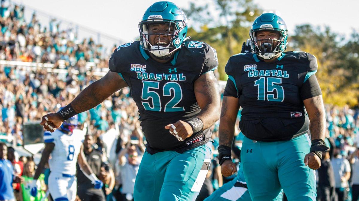 Coastal Carolina defensive lineman C.J. Brewer celebrates a sack for a safety against Georgia State during Homecoming on Nov. 13, 2021.