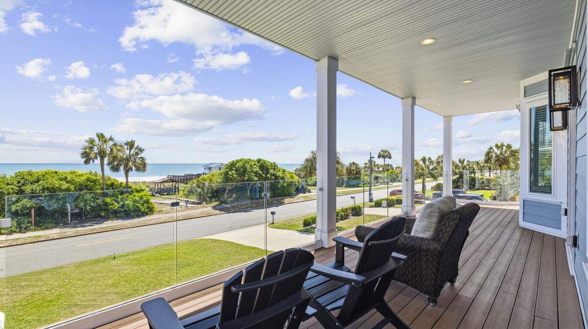 A view of the beach can be seen from the front of a property on North Ocean Boulevard. The house comes fully furnished.