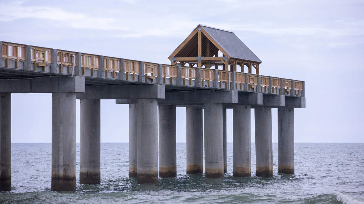 The rebuilding of Surfside Beach Pier, originally damaged by Hurricane Matthew in 2016, is nearing completion. Consensus Construction crews showed off the progress of the new concrete pier, designed to withstand waves of up to 15 feet over the deck, to city officials and media on Friday. The City of Surfside expects to take occupancy by August 8, 2023 if not sooner. June 2, 2023.