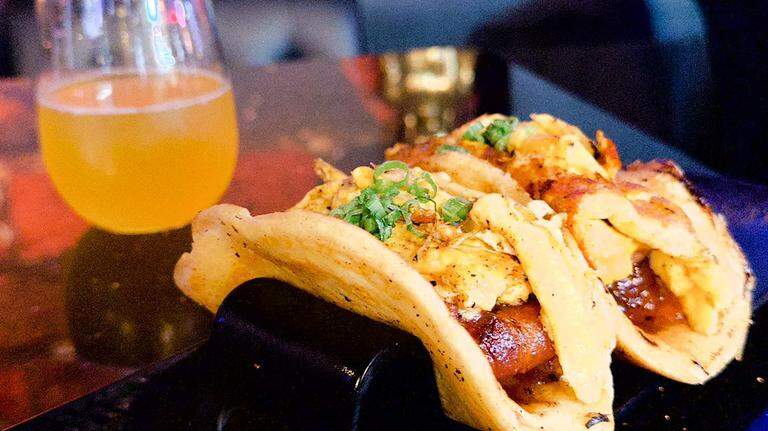 This Myrtle Beach spot has upgraded the classic dive bar. It offers sushi and tacos